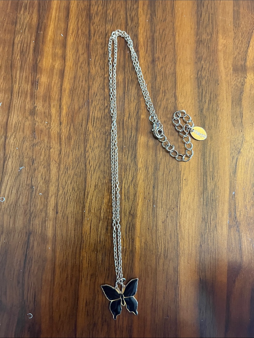Claire's Silver Necklace with Black Butterfly Pendant